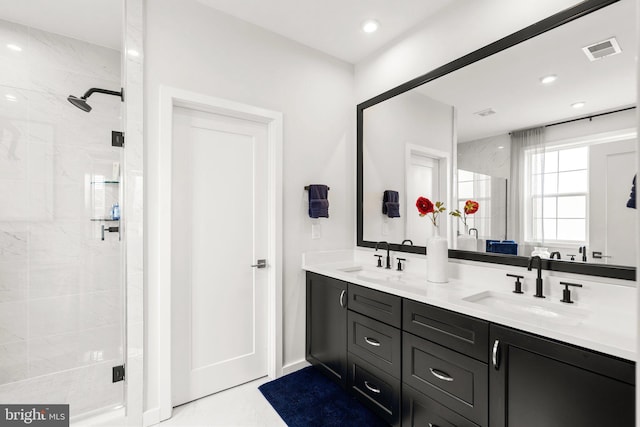 1741 Mckenna Point Dr Unit 2701, Mclean, VA 22102 - bathroom featuring a shower stall, double vanity, tile patterned flooring, and recessed lighting