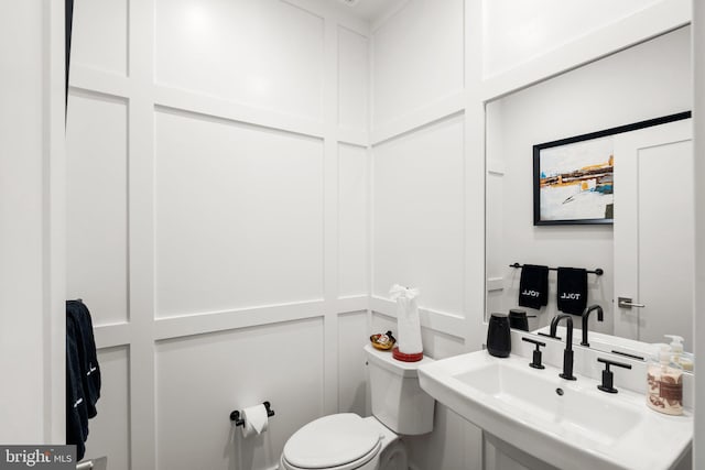1741 Mckenna Point Dr Unit 2701, Mclean, VA 22102 - half bath featuring a sink and toilet