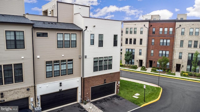 1741 Mckenna Point Dr Unit 2701, Mclean, VA 22102 - view of building exterior featuring a garage