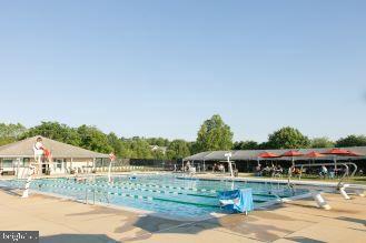 5590 Broadmoor Ter N, Ijamsville, MD 21754 - community pool with a patio