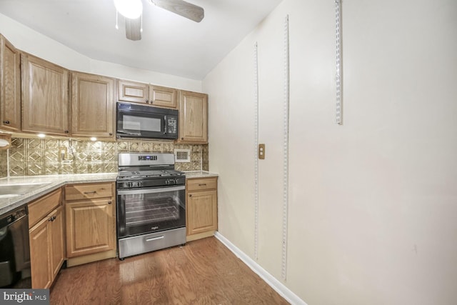 2939 Van Ness St NW Unit 608, Washington, DC 20008 - kitchen with black appliances, tasteful backsplash, wood finished floors, and a ceiling fan