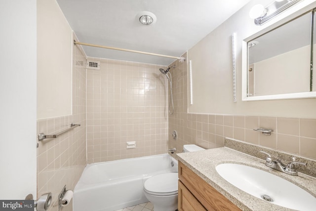 2939 Van Ness St NW Unit 608, Washington, DC 20008 - bathroom with tile walls, shower / washtub combination, vanity, and toilet