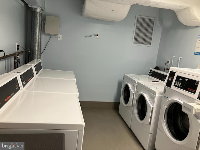 2939 Van Ness St NW Unit 608, Washington, DC 20008 - community laundry room featuring washer and dryer and baseboards
