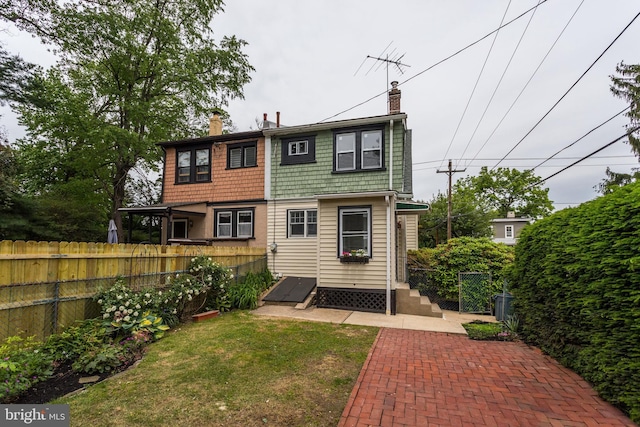 170 Drexel Ave, Lansdowne, PA 19050 - back of property featuring a chimney and a patio