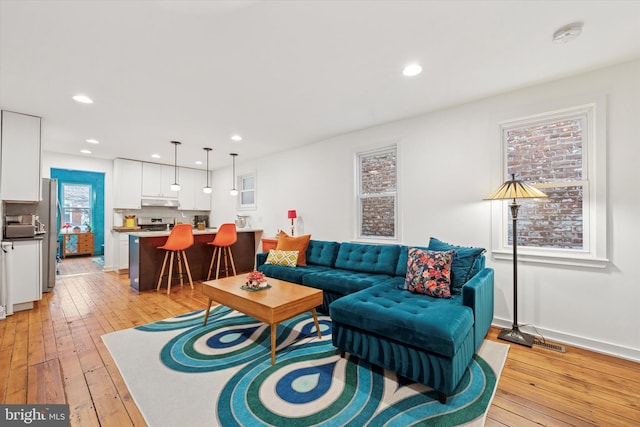 1620 E Berks St, Philadelphia, PA 19125 - living area with light wood-style flooring, recessed lighting, and baseboards