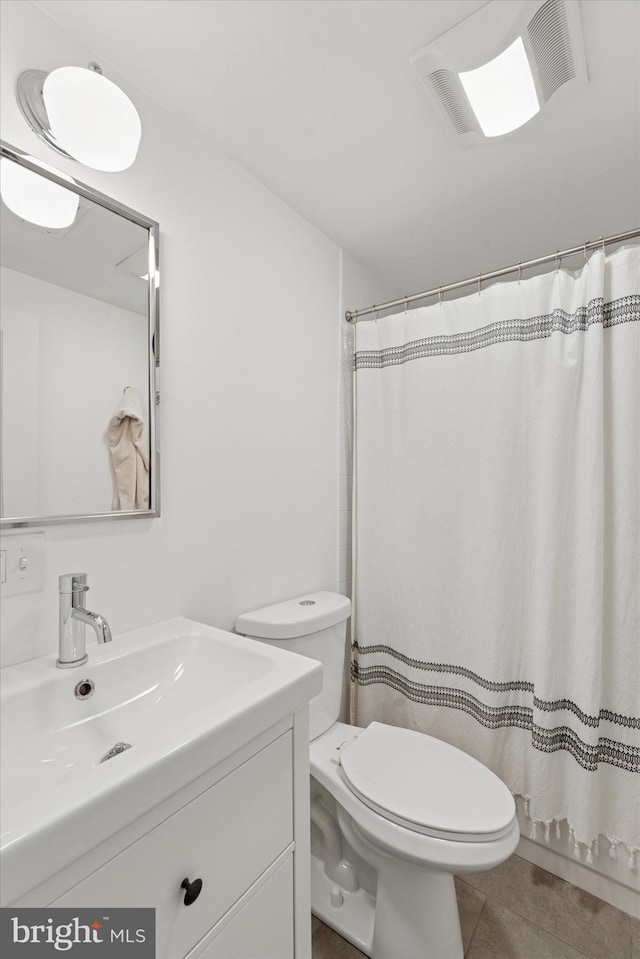 1620 E Berks St, Philadelphia, PA 19125 - full bathroom with toilet, vanity, tile patterned flooring, and a shower with curtain