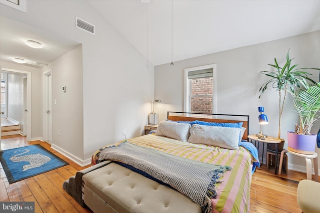 1620 E Berks St, Philadelphia, PA 19125 - bedroom with hardwood / wood-style floors, baseboards, and vaulted ceiling