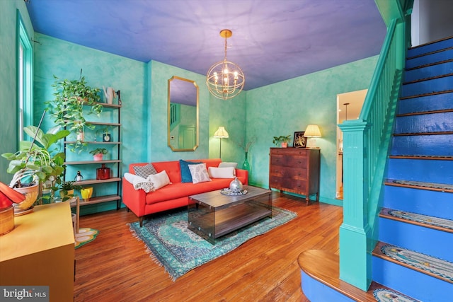 1620 E Berks St, Philadelphia, PA 19125 - living room with hardwood / wood-style flooring, stairs, and a chandelier