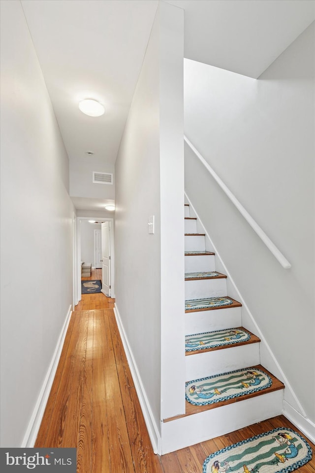 1620 E Berks St, Philadelphia, PA 19125 - hallway featuring wood-type flooring, stairway, and baseboards