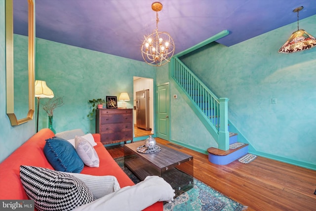 1620 E Berks St, Philadelphia, PA 19125 - living room featuring wood finished floors, a chandelier, and stairway