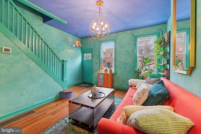 1620 E Berks St, Philadelphia, PA 19125 - living area featuring stairway, wood finished floors, and a chandelier