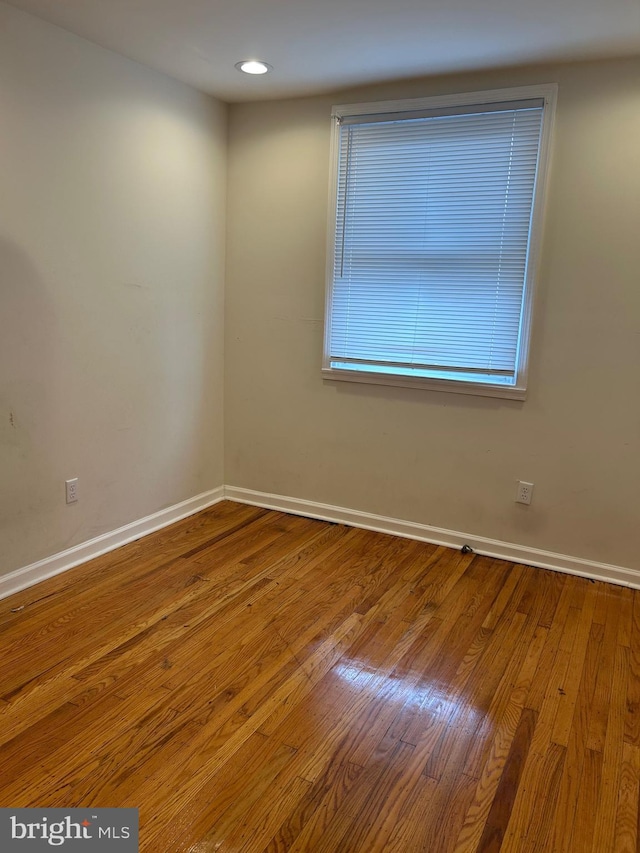 5221 N 8th St, Philadelphia, PA 19120 - unfurnished room with wood finished floors, baseboards, and recessed lighting