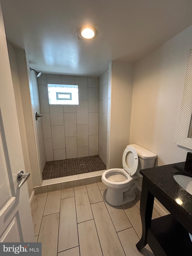 5221 N 8th St, Philadelphia, PA 19120 - full bath featuring toilet, a shower stall, and vanity