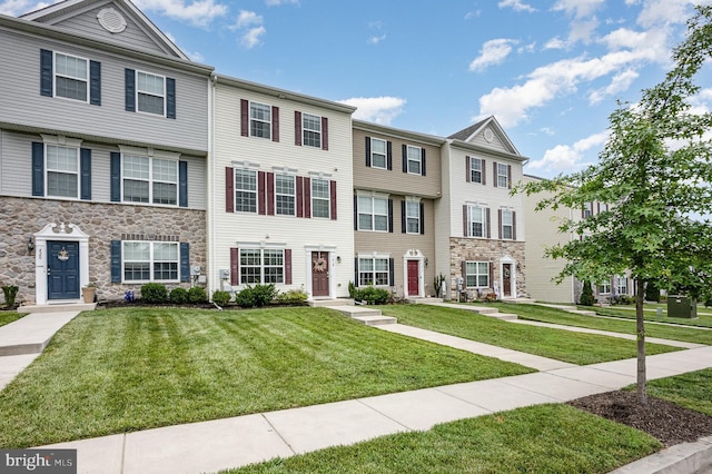 418 Charlestown Crossing Blvd, North East, MD 21901 - view of property with stone siding and a front lawn
