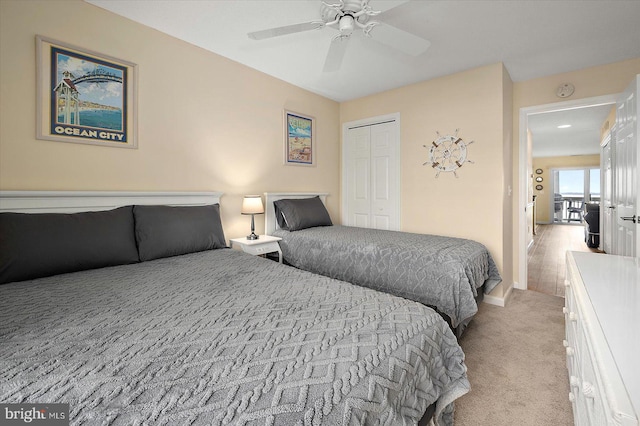 205 125th St Unit M253H8, Ocean City, MD 21842 - bedroom with light colored carpet, a closet, ceiling fan, and baseboards