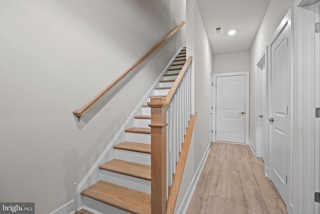 108 Annapolis St, Bensalem, PA 19020 - stairway with baseboards, wood finished floors, and recessed lighting