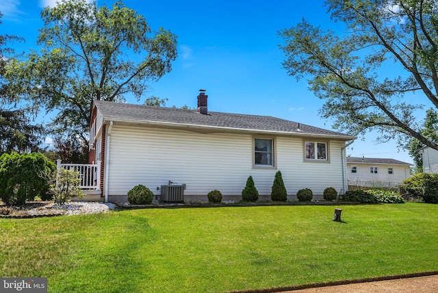 2603 Manall Ave, Pennsauken, NJ 08109 - back of property featuring a yard and a chimney
