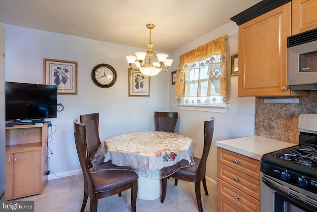 2603 Manall Ave, Pennsauken, NJ 08109 - dining space with a chandelier and light tile patterned floors