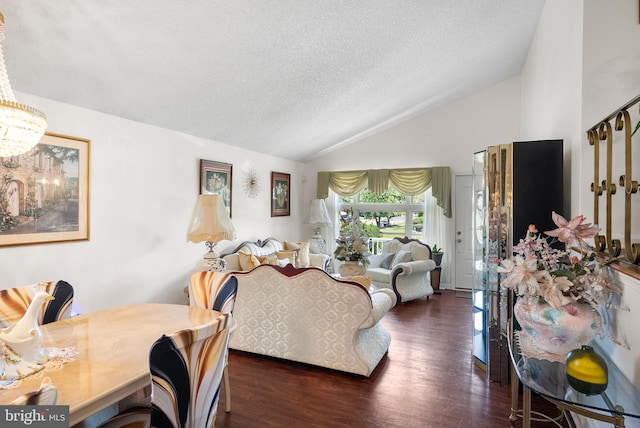2603 Manall Ave, Pennsauken, NJ 08109 - living room with vaulted ceiling, dark wood-style flooring, a chandelier, and a textured ceiling