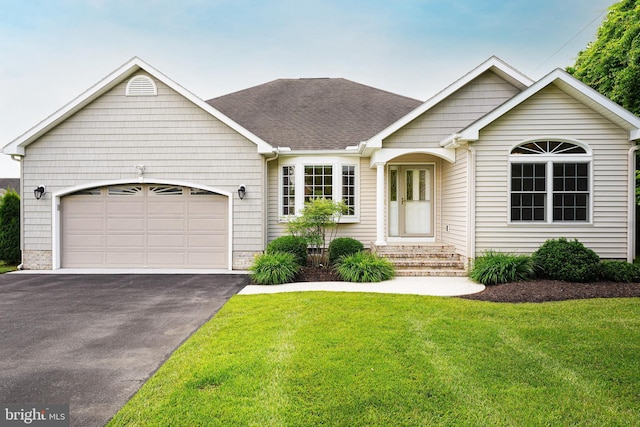 5991 Bell Creek Dr, Salisbury, MD 21801 - view of front of property featuring driveway, a front lawn, a garage, and a shingled roof