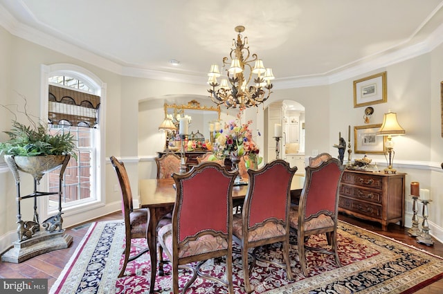1780 Eliza Way, Mechanicsburg, PA 17050 - dining space featuring arched walkways, a chandelier, crown molding, wood finished floors, and baseboards