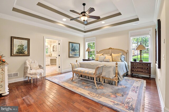 1780 Eliza Way, Mechanicsburg, PA 17050 - bedroom featuring a raised ceiling, multiple windows, dark wood finished floors, baseboards, and crown molding