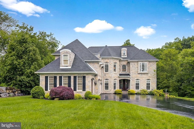 1780 Eliza Way, Mechanicsburg, PA 17050 - french country inspired facade with stone siding, a front yard, and a water view