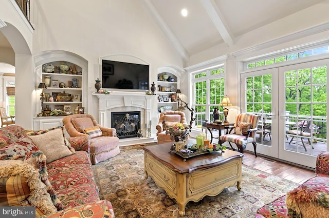 1780 Eliza Way, Mechanicsburg, PA 17050 - living room with beamed ceiling, built in features, healthy amount of natural light, high vaulted ceiling, and arched walkways