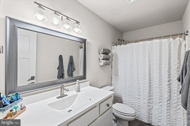 308 Walnut Dr, Fredericksburg, VA 22405 - bathroom with toilet, vanity, and a shower with shower curtain