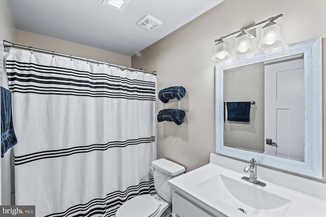308 Walnut Dr, Fredericksburg, VA 22405 - bathroom featuring toilet, vanity, and a shower with shower curtain
