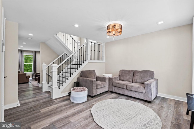 308 Walnut Dr, Fredericksburg, VA 22405 - living area featuring stairs, wood finished floors, baseboards, a chandelier, and recessed lighting