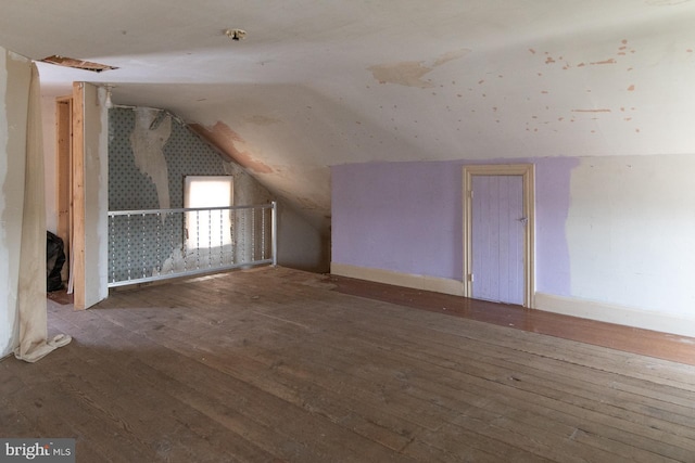 21 E 3rd St, Boyertown, PA 19512 - additional living space featuring hardwood / wood-style floors, vaulted ceiling, and baseboards