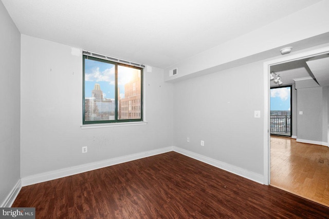 414 Water St Unit 2805, Baltimore, MD 21202 - spare room with wood finished floors and baseboards