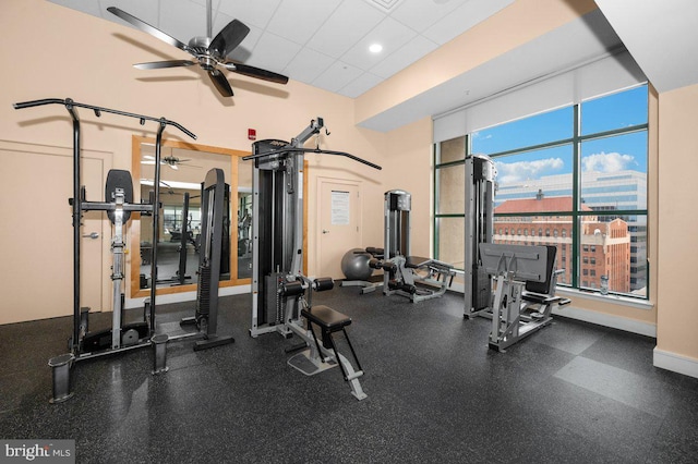 414 Water St Unit 2805, Baltimore, MD 21202 - exercise room featuring a ceiling fan, baseboards, and a paneled ceiling