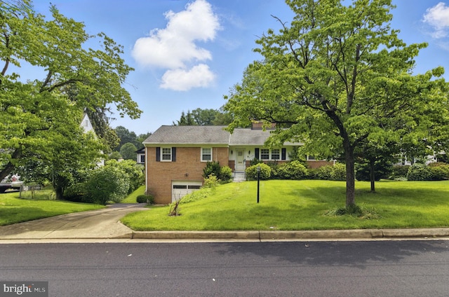 6178 Hardy Dr, Mclean, VA 22101 - view of front facade featuring driveway, a garage, a front lawn, brick siding, and a chimney