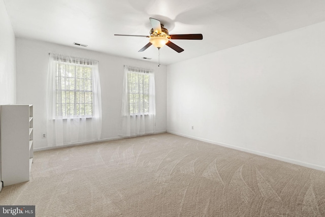 140 Hoile Ln, Huntingtown, MD 20639 - spare room with ceiling fan, carpet floors, and baseboards