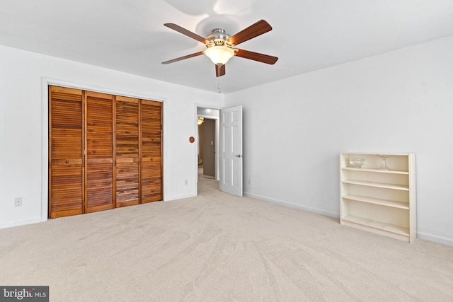 140 Hoile Ln, Huntingtown, MD 20639 - unfurnished bedroom featuring a closet, carpet flooring, baseboards, and a ceiling fan