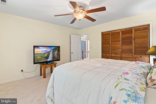 140 Hoile Ln, Huntingtown, MD 20639 - carpeted bedroom with a closet, baseboards, and a ceiling fan