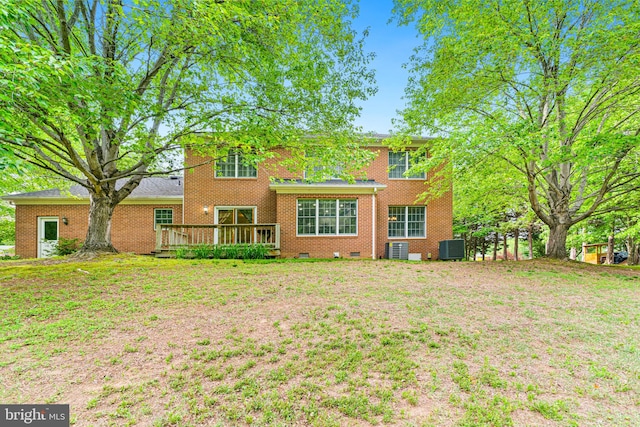 140 Hoile Ln, Huntingtown, MD 20639 - rear view of house featuring brick siding, cooling unit, a deck, and crawl space
