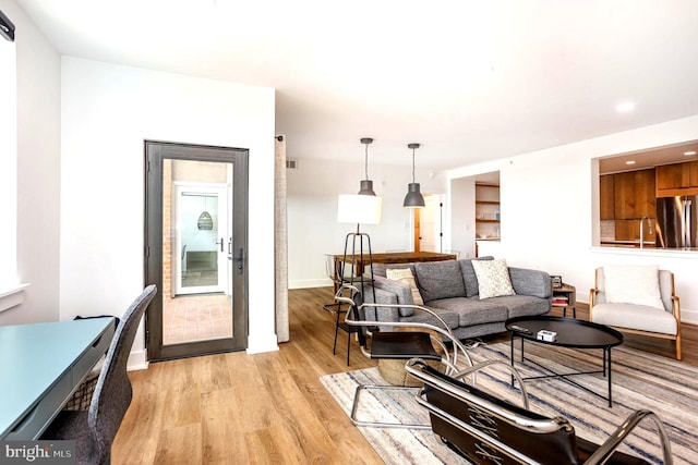 3801 Canterbury Rd Unit 705, Baltimore, MD 21218 - living area with light wood-style floors, baseboards, and recessed lighting