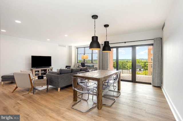 3801 Canterbury Rd Unit 705, Baltimore, MD 21218 - dining space with light wood-style floors, recessed lighting, and baseboards