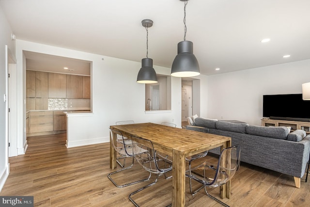 3801 Canterbury Rd Unit 705, Baltimore, MD 21218 - dining room featuring light wood-style floors, recessed lighting, and baseboards