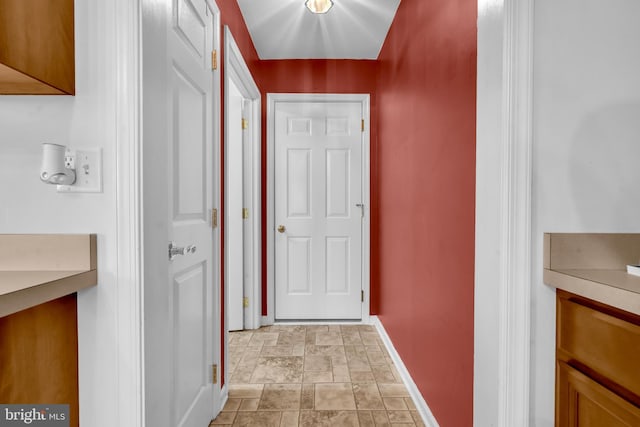 15 Ridgeway Dr, Ridgely, MD 21660 - corridor featuring stone finish flooring and baseboards