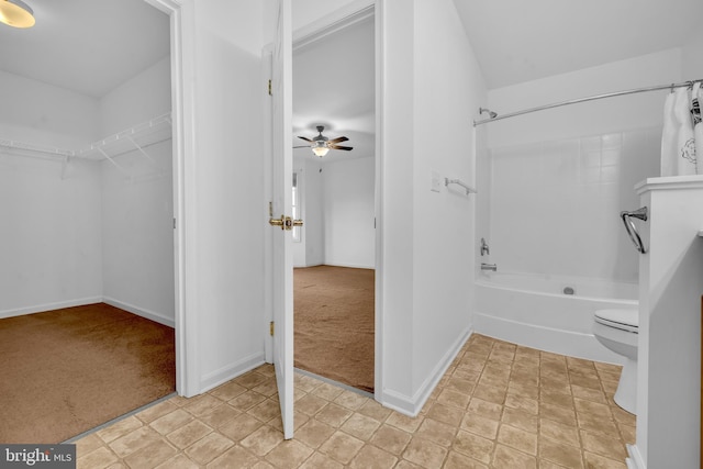 15 Ridgeway Dr, Ridgely, MD 21660 - bathroom featuring shower / tub combo, ceiling fan, and a walk in closet