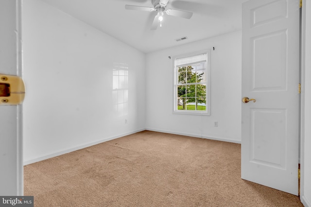 15 Ridgeway Dr, Ridgely, MD 21660 - unfurnished bedroom with carpet floors, vaulted ceiling, and a ceiling fan