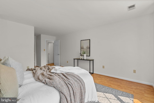9109 Knox Ct, Laurel, MD 20723 - bedroom featuring wood finished floors and baseboards