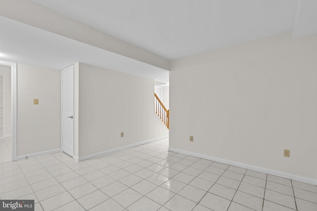 9109 Knox Ct, Laurel, MD 20723 - spare room featuring stairs, baseboards, and light tile patterned floors