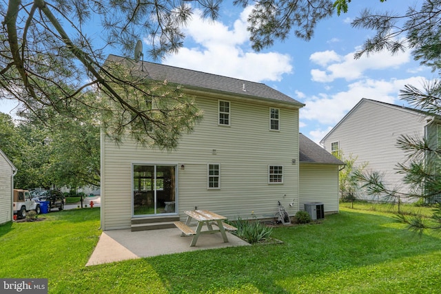 9109 Knox Ct, Laurel, MD 20723 - rear view of house with a patio area, central AC, and roof with shingles