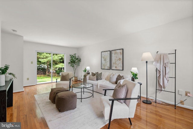 9109 Knox Ct, Laurel, MD 20723 - living area with hardwood / wood-style floors and baseboards