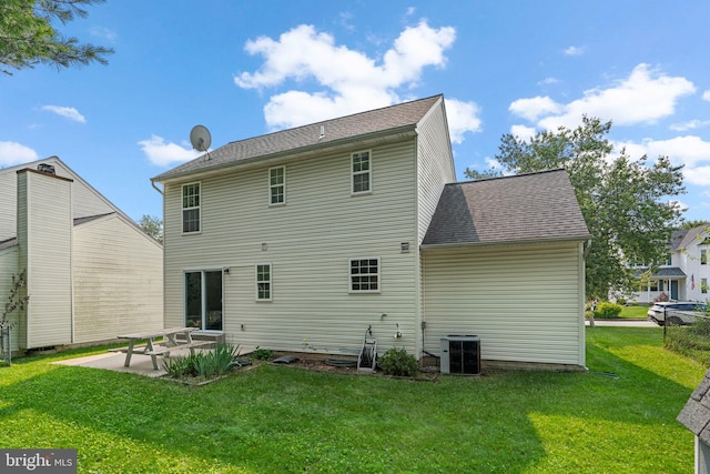 9109 Knox Ct, Laurel, MD 20723 - rear view of house featuring a patio area, a lawn, cooling unit, and roof with shingles